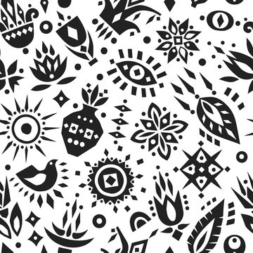 Vector seamless pattern of black cut out flowers and geometric shapes.