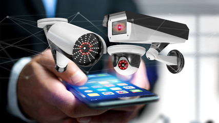 Businessman using a smartphone with a Security camera system and network connection - 3d rendering