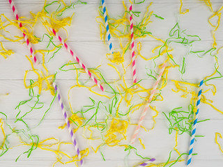 balloons, colored ribbons and tubules for a cocktail, background, holiday, bright
