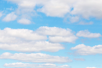Naklejka na ściany i meble Closeup Blue sky with white clouds background