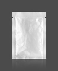 aluminum foil snack sachet isolated on gray background