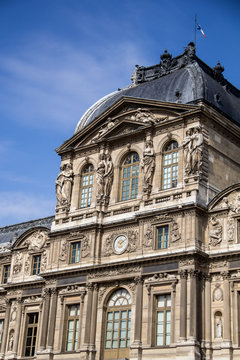 Main building of Louvre Museum (Musée du Louvre) in a clear day
