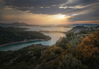 sunset on coast of sea