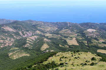 Obraz premium Aerial natural landscape photo of mountains and the sea
