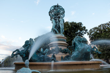 Turtle statues of Fountain of the Four Parts of the World (Fontaine Des Quatre Parties Du Monde) at Jardin des Grands Explorateurs in Paris France
