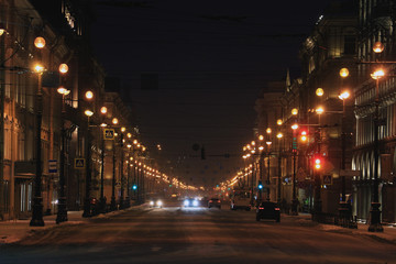Fototapeta na wymiar traffic on a winter night street