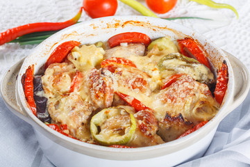 Traditional tasty rustic stew of chicken and vegetables, decorated with tomatoes