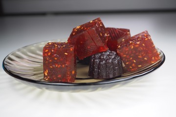pieces of natural marmalade in a glass plate