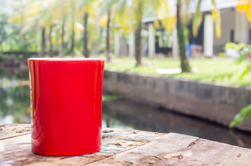 Red coffee in the coconut garden next to the house in Phuket Thailand