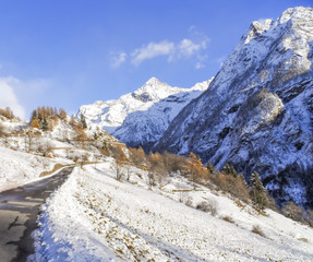 Mountains with snow in a sunny day at Bionaz, Aosta Valley Province, Italy