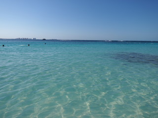 Panoramic view of turquoise waters of Caribbean Sea landscape with horizon line at Cancun city in Mexico