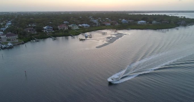 Stuart Florida at Sunset and Speed Boat on St Lucie River
