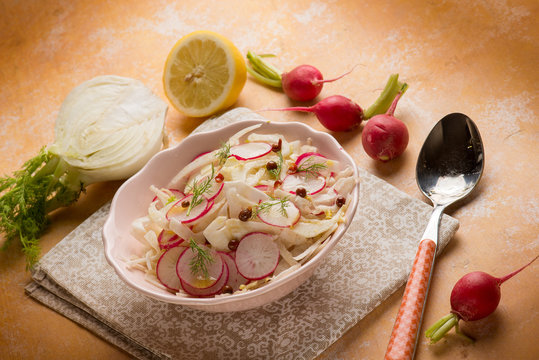 mixed salad with fennel radish lemon and pink pepper