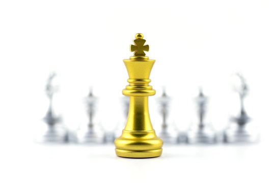 Gold king in chess game with Concept for company strategy,business victory or decision the path to success.