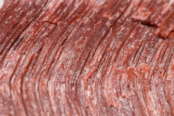 Macro mineral stone Bull eye, tiger's eye in the breed on a white background