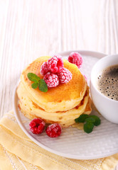 Pancakes with honey and raspberry