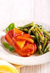Pork chop with pineapple in tomato sauce