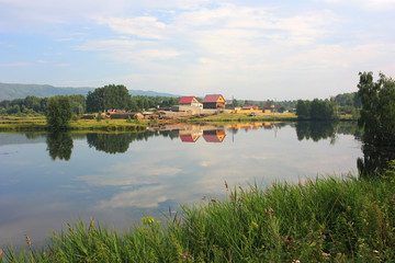 Fototapeta premium Houses on the lake shore