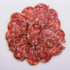 Saucisson sec delicious french salami on a white background