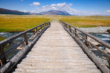 Fototapeta premium Wooden bridge in Altai Mountains Mongolia