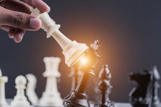Chess game stand on chessboard Concept for company strategy,business victory or decision the path to success.