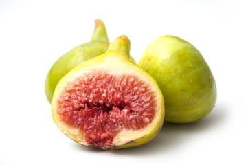 closeup of green figs fruit on white background