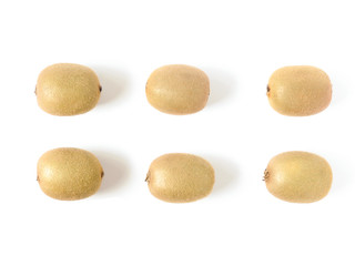 Top view of six ripe fresh kiwifruits neatly arranged isolated on white background. Kiwi has fibrous, flesh and edible black seeds.Fruit, nature, health and nutrition concept. Summer food.Copy space.