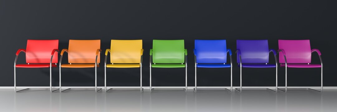 Colorful chairs on dark background - wide banner 
