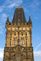 Fototapeta na wymiar Powder Gate Tower architecture detail, the Royal Route start, Old Town, UNESCO World Heritage Site, Prague, Czech Republic, sunrise sunny day