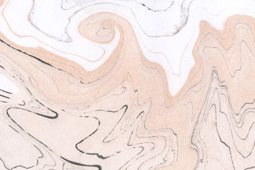 Ochre and white ink marble texture.