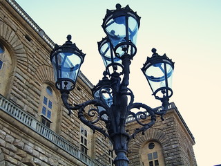 Fototapeta na wymiar Street lamp in Pitti square, Florence, Italy