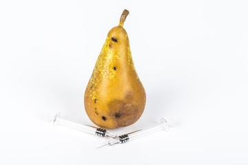 Close up Boring trace of a codling moth Cydia Pomonella, in a wormy pear. On white background. With...