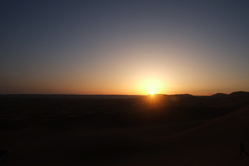 Plakat Sunrise at the dawn over sand dunes at Erg Chebbi, Sahara desert. Merzouga, Morocco.