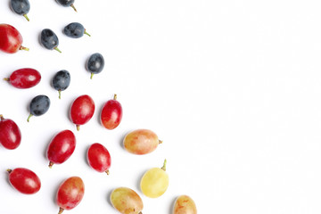 Fresh ripe juicy grapes on white background, top view. Space for text