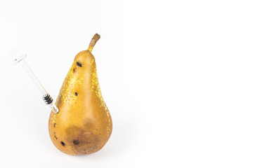 Close up Boring trace of a codling moth Cydia Pomonella, in a wormy pear. On white background. With...