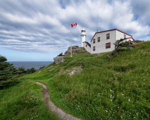 Fototapeta na wymiar Lobster Cove Head Lighthouse at Rocky Harbour, Newfoundland