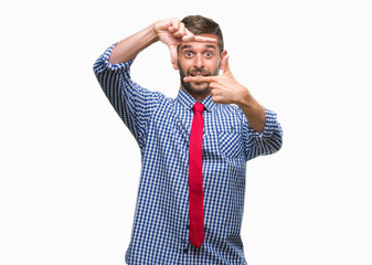 Young handsome business man over isolated background smiling making frame with hands and fingers with happy face. Creativity and photography concept.