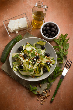 grilled zucchinis salad with feta cheese and olives