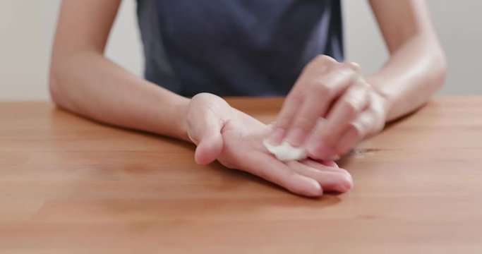 Woman suffer from hand perspiration