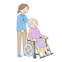 介護職_車椅子を押す_全身_女性