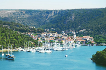 Fototapeta na wymiar Skradin city and bay with ships and yachts in Croatia.
