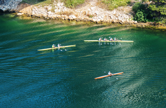 Group of kayakers in the lake. Aerial view.