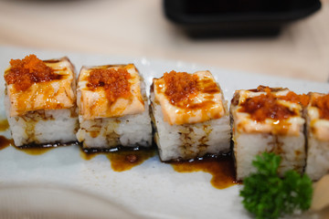 Grilled or burn Salmon sushi Nigiri rolls