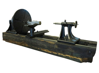Vintage old turning lathe machine isolated over white background