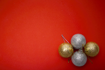 Christmas balls on red papar
