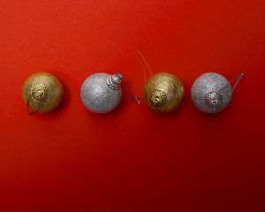 Christmas balls on red papar