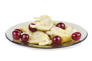 Plate with traditional ukrainian cherry damplings