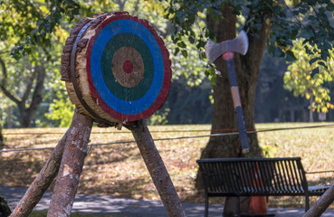 Axe throwing with wooden target, park, summer, Halifax, fun.