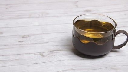 cup of tea on a white wooden table