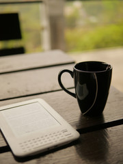 ebook and cup of coffe in relaxing day